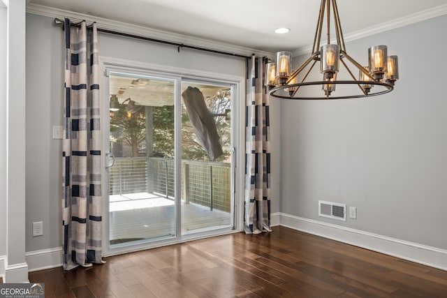 unfurnished dining area with baseboards, crown molding, visible vents, and dark wood-style flooring