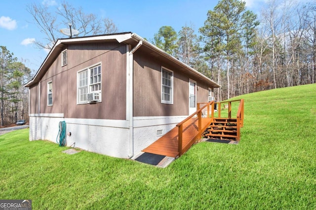 view of property exterior with a yard and crawl space