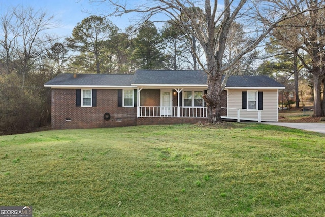 ranch-style house featuring a porch, crawl space, brick siding, and a front lawn