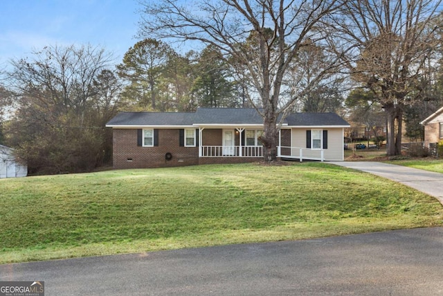 single story home with crawl space, brick siding, a porch, and a front yard