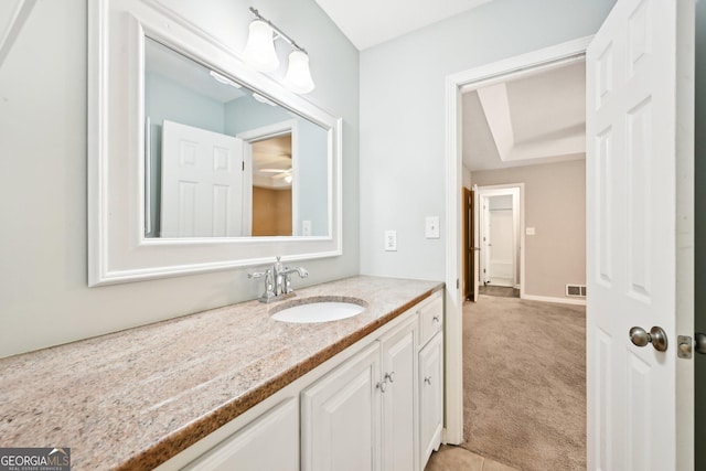 bathroom featuring visible vents and vanity