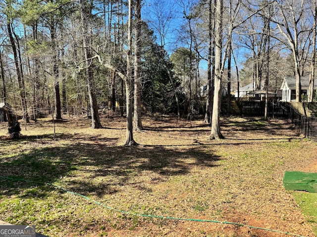 view of yard featuring fence