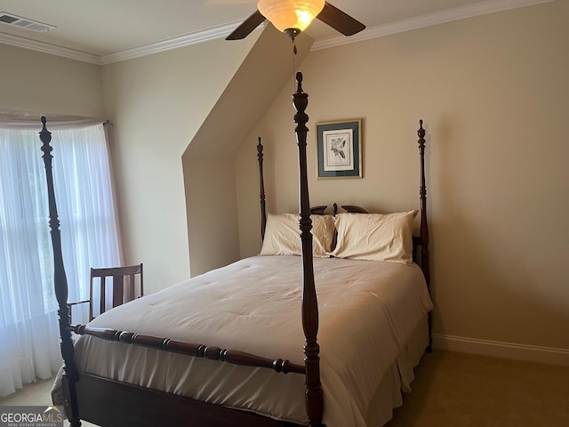 bedroom with baseboards, visible vents, ornamental molding, and carpet flooring