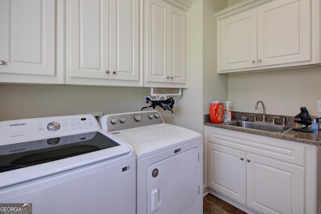 8440 Woodland Brooke Trl, Cumming, GA 30028 - laundry room with cabinet space and washing machine and dryer