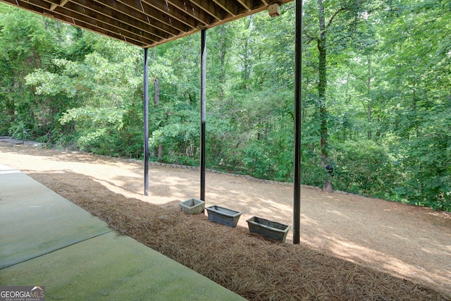 8440 Woodland Brooke Trl, Cumming, GA 30028 - view of yard with a wooded view