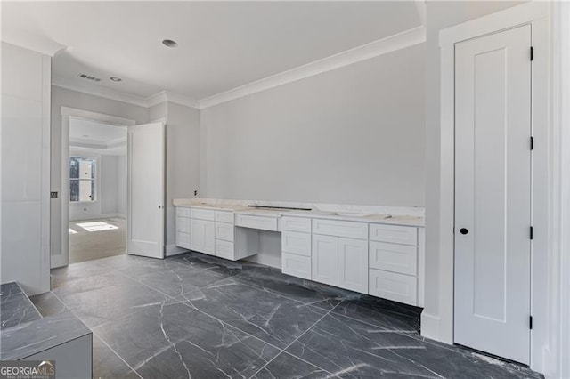 full bathroom with marble finish floor, crown molding, and vanity