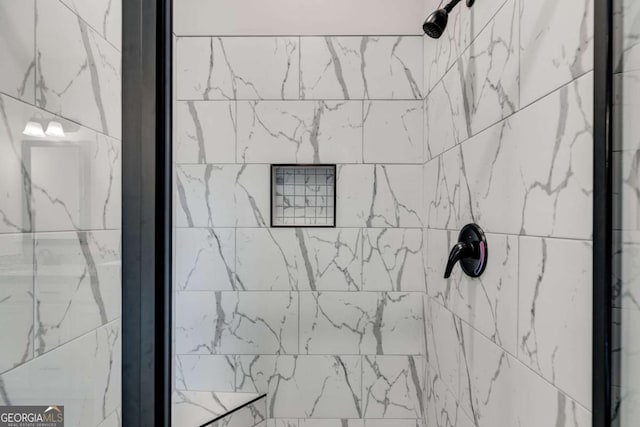 details featuring a tile shower