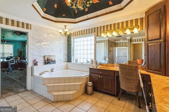 full bathroom with ornamental molding, a raised ceiling, vanity, and wallpapered walls