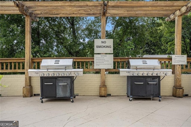 2479 Peachtree Rd NE Unit 1115, Atlanta, GA 30305 - view of patio featuring a pergola