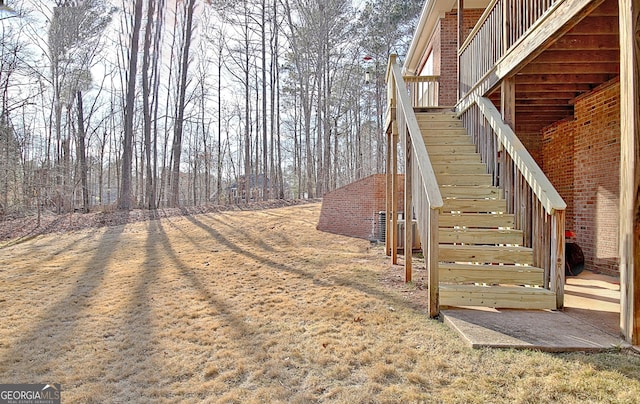 view of yard featuring stairway