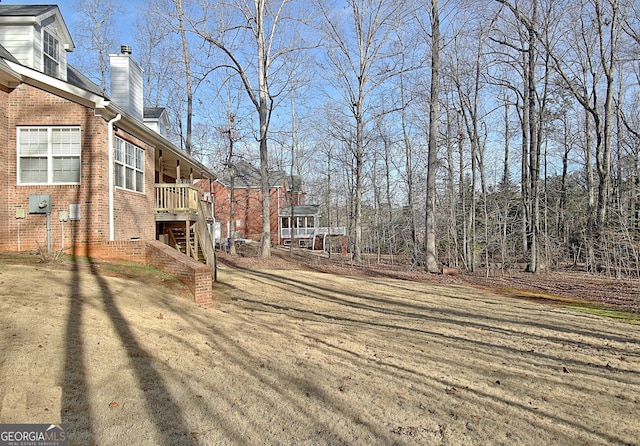 view of yard featuring stairs