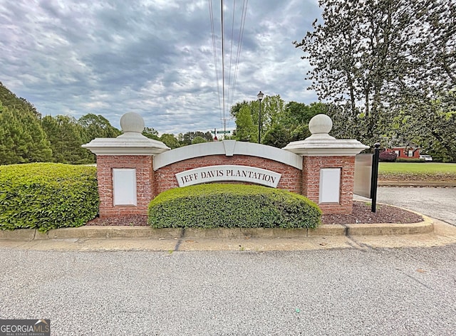 view of community sign