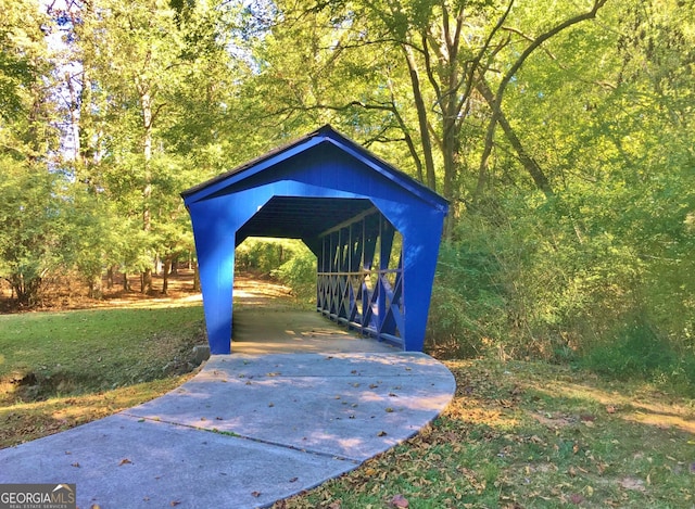 view of property's community with a carport