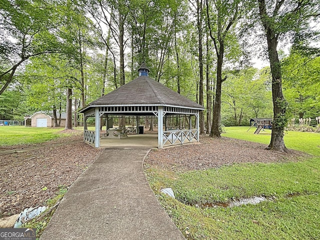 view of community featuring an outbuilding