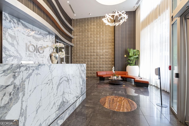 reception area with an inviting chandelier