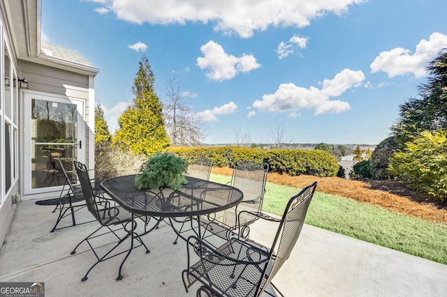 view of patio featuring outdoor dining space