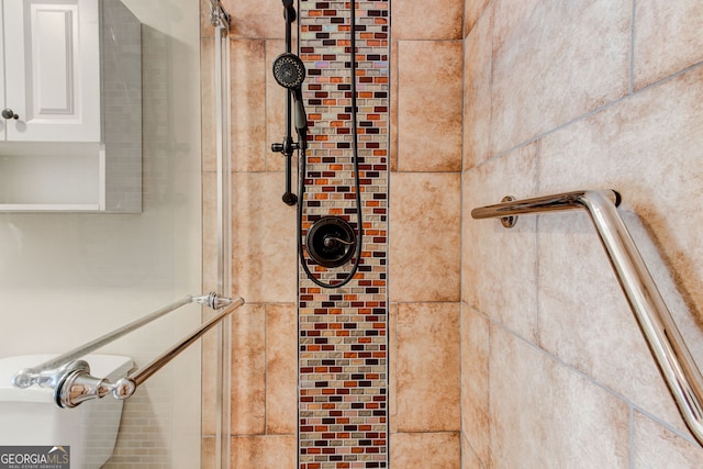 interior space featuring a tile shower