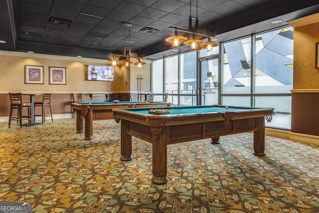 rec room with pool table, plenty of natural light, and visible vents