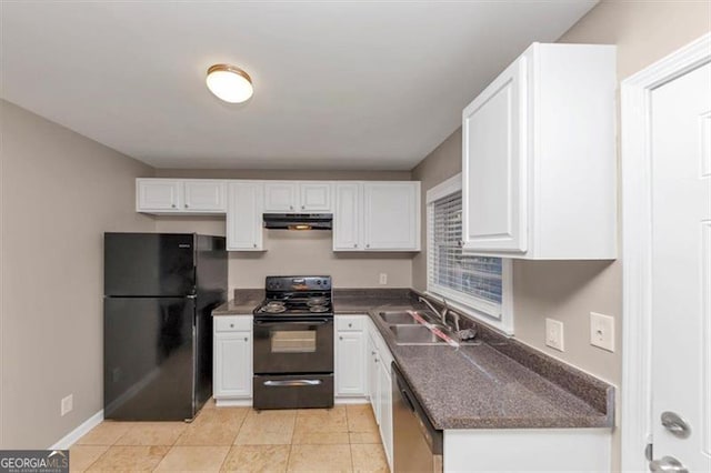 kitchen with dark countertops, white cabinetry, a sink, and black appliances