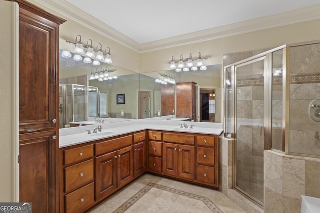 full bathroom with ornamental molding, a sink, a shower stall, and double vanity