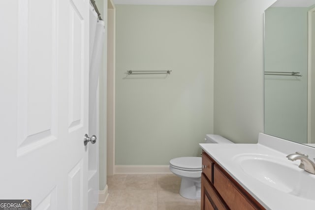 full bathroom featuring baseboards, toilet, a shower with curtain, tile patterned floors, and vanity