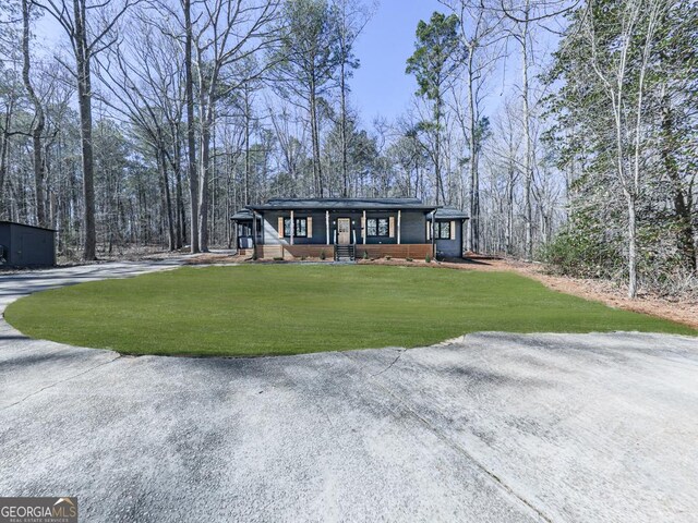 mid-century home with covered porch