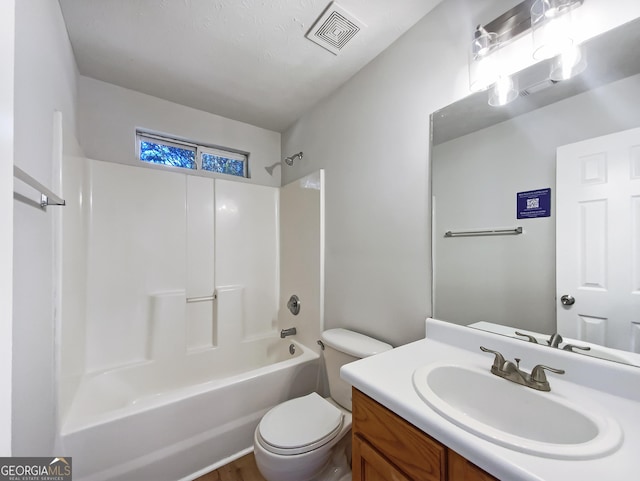 full bath with toilet, visible vents, tub / shower combination, and vanity