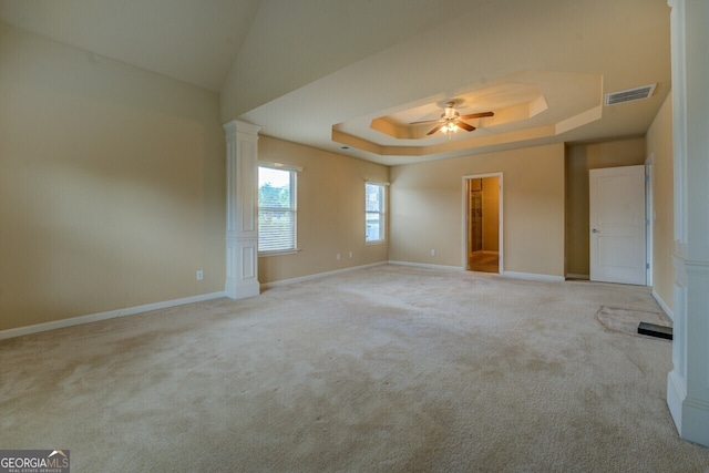 1186 Diamond Xing, Mcdonough, GA 30252 - unfurnished bedroom with carpet floors, ornate columns, a tray ceiling, and baseboards