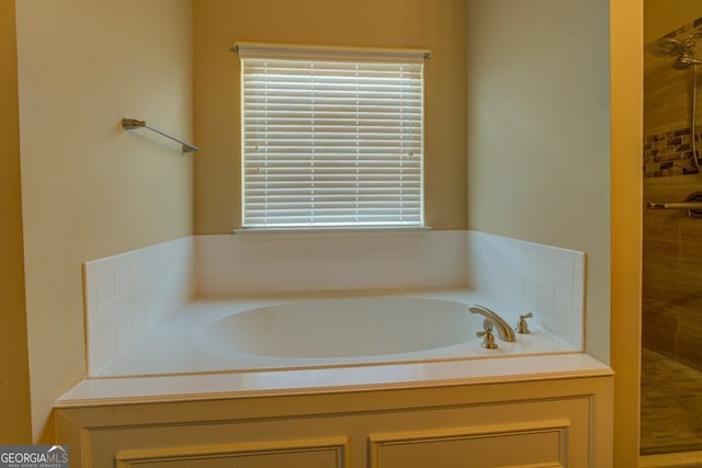 1186 Diamond Xing, Mcdonough, GA 30252 - bathroom with a tile shower and a garden tub