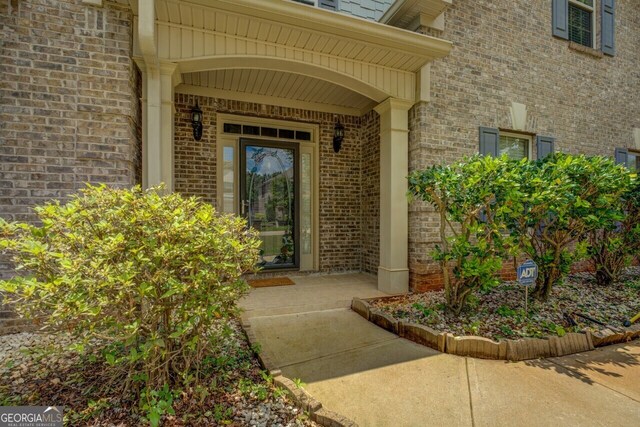 1186 Diamond Xing, Mcdonough, GA 30252 - view of exterior entry featuring brick siding