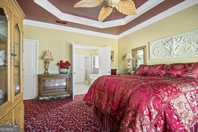 bedroom featuring carpet, crown molding, a raised ceiling, visible vents, and ceiling fan