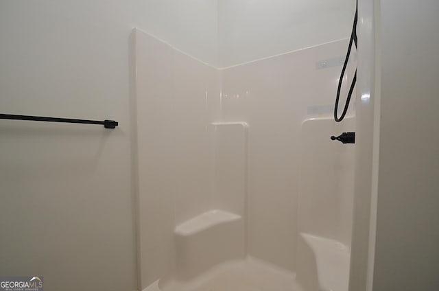 bathroom with walk in shower