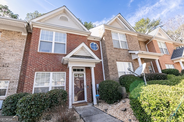 multi unit property featuring brick siding