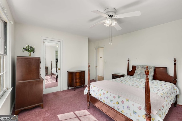 carpeted bedroom with a ceiling fan