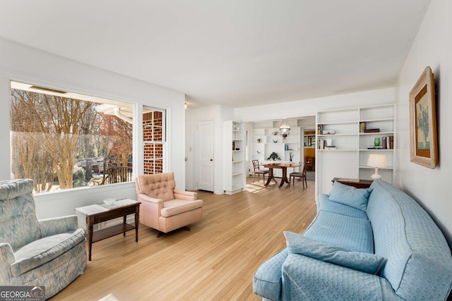 living area featuring light wood-style flooring