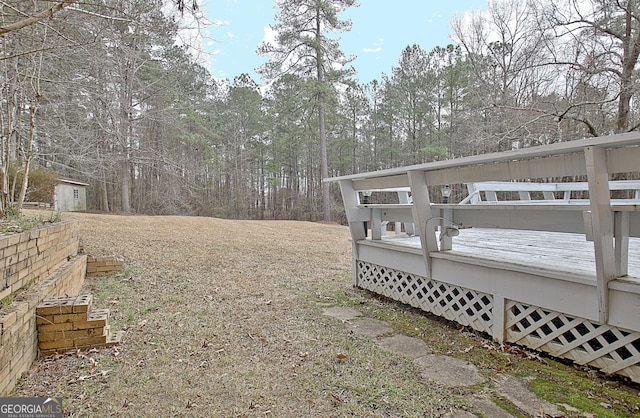 view of yard featuring a deck