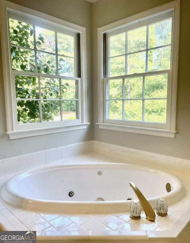 full bath featuring a jetted tub