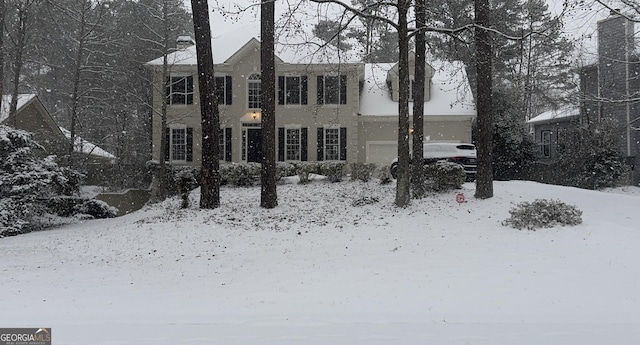 colonial-style house with a garage