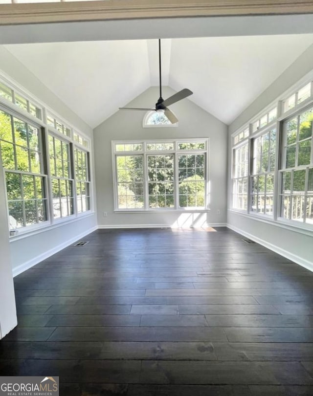 unfurnished sunroom with lofted ceiling, visible vents, and a ceiling fan