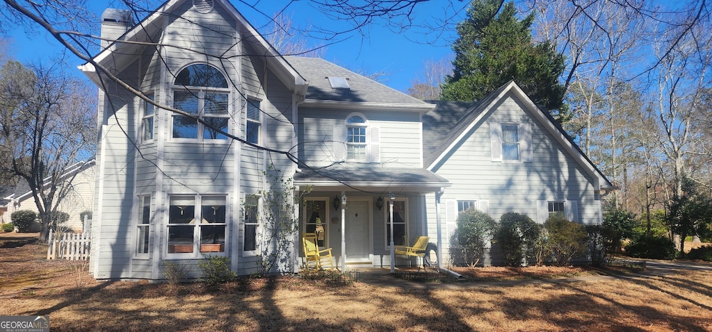 300 Legacy Ln, Peachtree City, GA 30269 - view of front of property featuring fence and a chimney