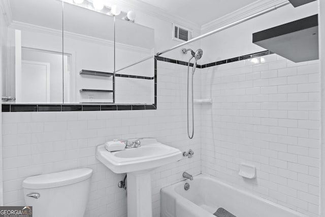 bathroom featuring toilet, visible vents, crown molding, and shower / bathtub combination