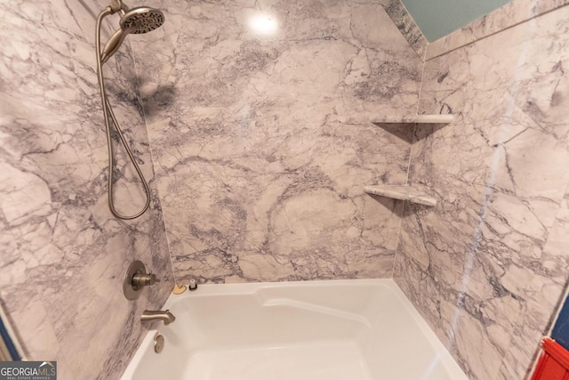 bathroom featuring shower / tub combination