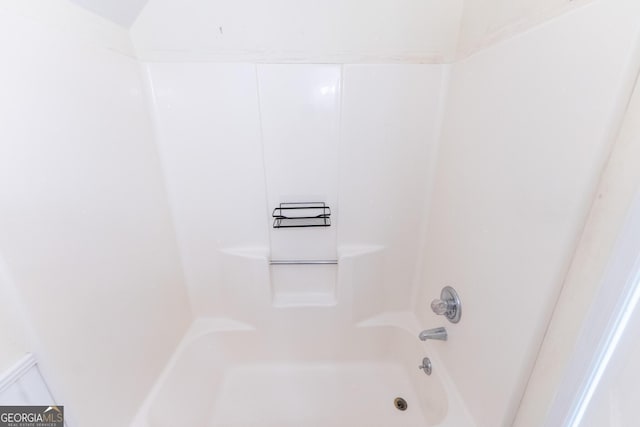 bathroom featuring bathing tub / shower combination