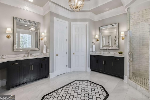 full bathroom featuring ornamental molding, a sink, and an inviting chandelier