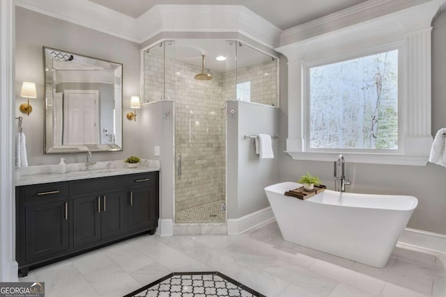 full bath with baseboards, ornamental molding, a freestanding bath, vanity, and a shower stall