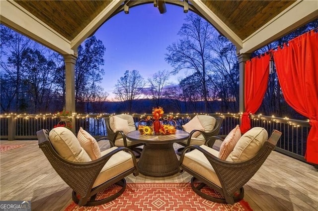 view of patio terrace at dusk