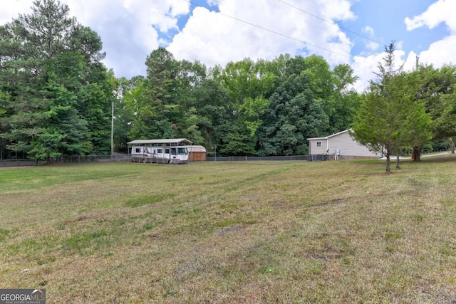 view of yard with fence