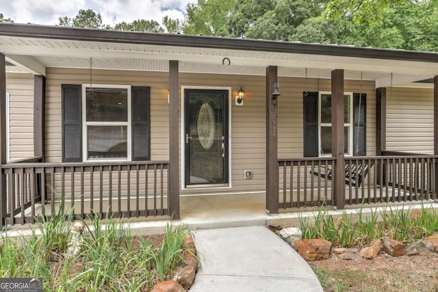 entrance to property with a porch