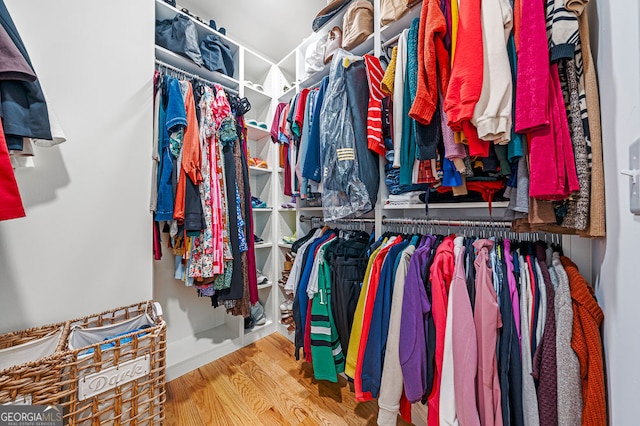 spacious closet with wood finished floors