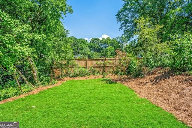 view of yard featuring fence